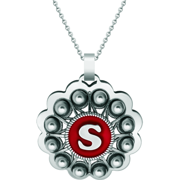 Colgante Botón Charro en plata y acero personalizadoReferencia: CO1939Colgante fabricado en plata de ley y acero pulido suave al tacto, personalizado con su inicial esmaltada al horno.