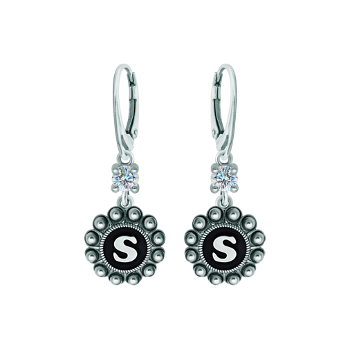 Personalized earrings Charro Button in silver with moissaniteRef. code: PE3364Earrings made in sterling silver personalized with your name initial enameled in the oven with a 5mm brilliant cut moissanite set.Moissanite is a precious gemstone created in a laboratory that has earned a special place in jewelry for its beauty and unique qualities, it dazzles for its brilliance superior to diamond and its great resistance (9.25 on the Mohs scale).Originally discovered in a meteorite at the end of the 19th century, this 