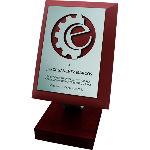 Plaque commémorative en acier et bois massif « Logo d'entreprise »Referencia: PL0346Plaque en bois massif avec logo découpé et gravé dans l'acier.Dimensions du support : 14x14x3cm.Dimensions de l'assiette : 20x26x3cm.