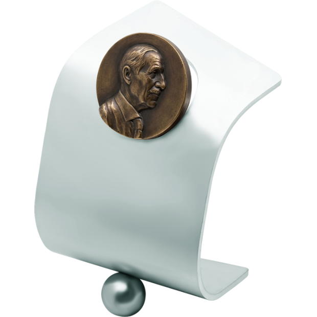 Trophy with personalized face in bronzeRef. code: PL0453Face in bronze on a polished solid steel plate. The face is completely personalized and is carved from a photograph achieving a surprising and faithful result.