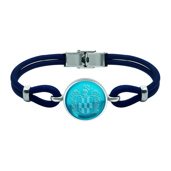 Silver and leather heraldic bracelet with 18mm colored crystalRef. code: PU28483mm thick leather and sterling silver bracelet with an 18mm colored crystal cabochon engraved with your surname shield on the crystal.