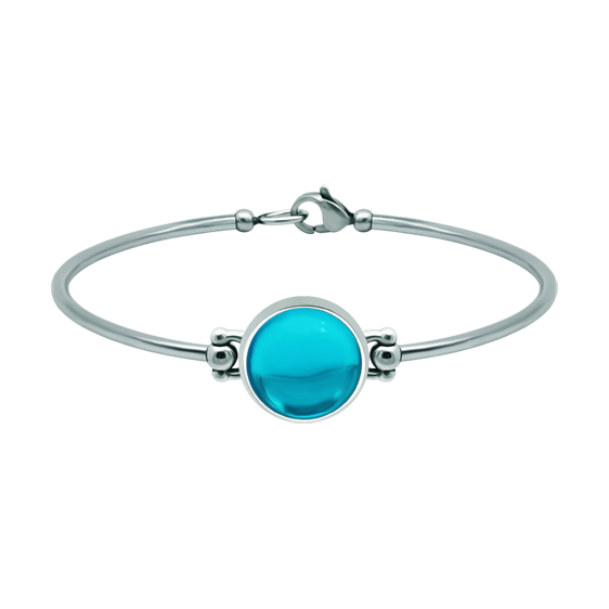Bracelet en argent et acier inoxydable avec cristal coloré 14 mmReferencia: PU2864Bracelet rigide en acier inoxydable et argent sterling avec un cabochon en verre coloré de 14 mm.
