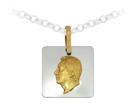 Pendentif en or "Face"Referencia: CO1243Pendentif en or et acier.Personnalisé avec votre visage sculpté en or.Medida: 23x23mm.