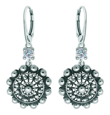 Charro Button earrings with moissanite in silverRef. code: PE3354Earrings made in sterling silver with a 5mm brilliant cut moissanite.Moissanite is a precious gemstone created in a laboratory that has earned a special place in jewelry for its beauty and unique qualities, it dazzles for its brilliance superior to diamond and its great resistance (9.25 on the Mohs scale).Originally discovered in a meteorite at the end of the 19th century, this 