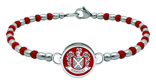 Personalized silver and steel bracelet "Heraldic shield" (Red)Ref. code: PU2819Rigid steel ball bracelet with the heraldic coat of arms of your surname carved in sterling silver and enameled in the oven.Size: 16x16mm.