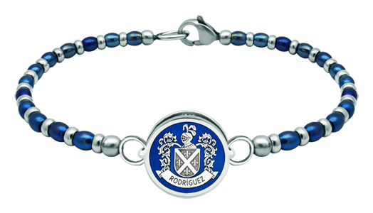 Silver and steel heraldic braceletRef. code: PU2820Steel ball chain bracelet with the coat of arms of your surname carved in sterling silver and enameled in the oven.Size: 16x16mm.