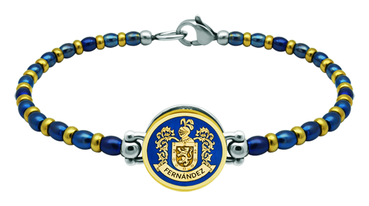 Heraldic bracelet in gold and steel (Blue)Ref. code: PU2821Steel ball chain bracelet and gold plated with the coat of arms of his surname carved in low relief in 18 kt gold and enameled in the oven.Size: 16x16mm.