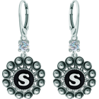 Personalized earrings Charro Button in silver with moissaniteRef. code: PE3363Earrings made in sterling silver personalized with your name initial enameled in the oven with a 5mm brilliant cut moissanite set.Moissanite is a precious gemstone created in a laboratory that has earned a special place in jewelry for its beauty and unique qualities, it dazzles for its brilliance superior to diamond and its great resistance (9.25 on the Mohs scale).Originally discovered in a meteorite at the end of the 19th century, this 