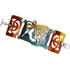 Art Nouveau "Woman with flowers and laces" silver and tortoiseshell braceletRef. code: PU0234Art Nouveau bracelet made of tortoiseshell and sterling silver.Flowers enameled in blue, yellow and amber.Museum pieces inspired by the most representative works of the Art Nouveau and Art Déco movement, and modernism from the late 19th and early 20th centuries.Size: 170x53mm.