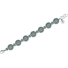 Pulsera Botón Charro en plata y acero, 7 botones.Referencia: PU2722Pulsera de botones charros fabricados en plata de ley.Medida: 16x16mm.